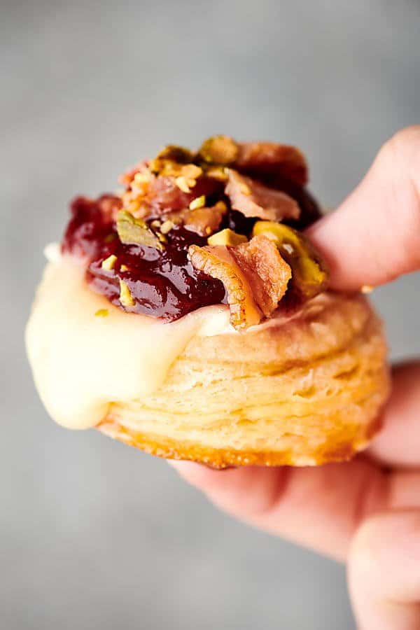 Cranberry brie bite held