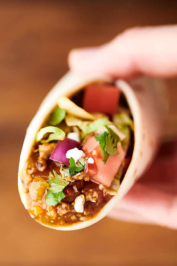 Side view of instant pot turkey taco being held 