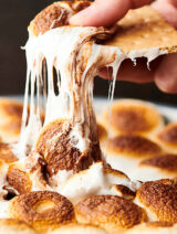 smores dip with gooey marshmallow and graham cracker
