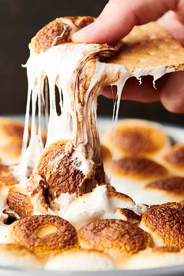 smores dip with gooey marshmallow and graham cracker