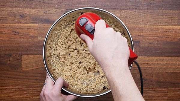 Butter and sugars being mixed