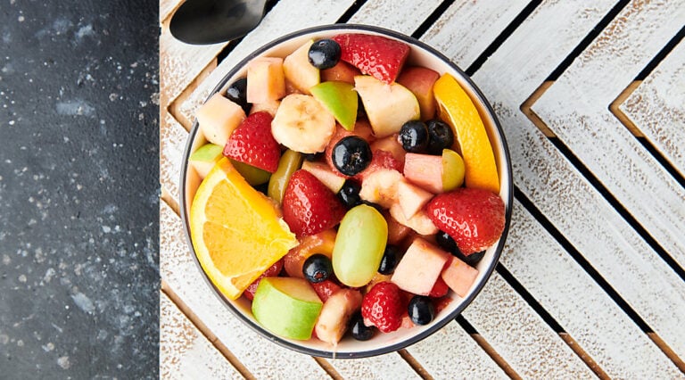 Bowl of fruit salad above