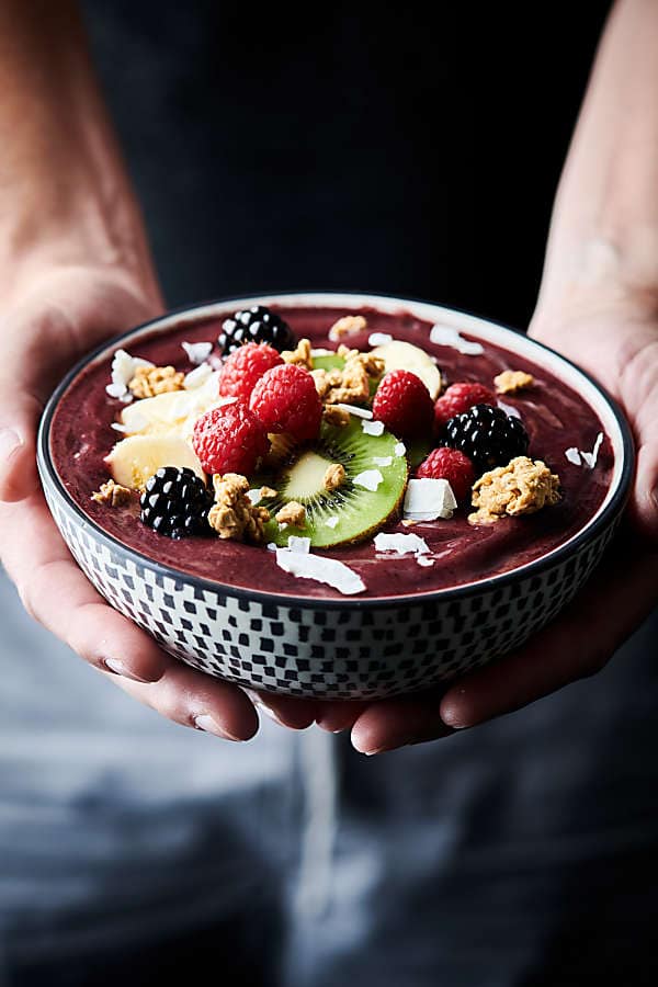 acai bowl held two hands