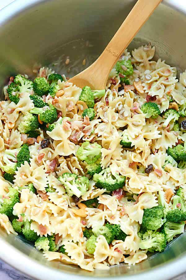 large bowl of broccoli pasta salad above