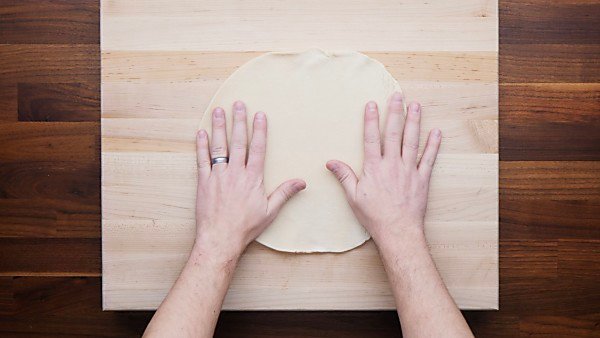 pie crust dough on cutting board