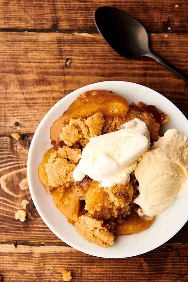 plate of peach cobbler above