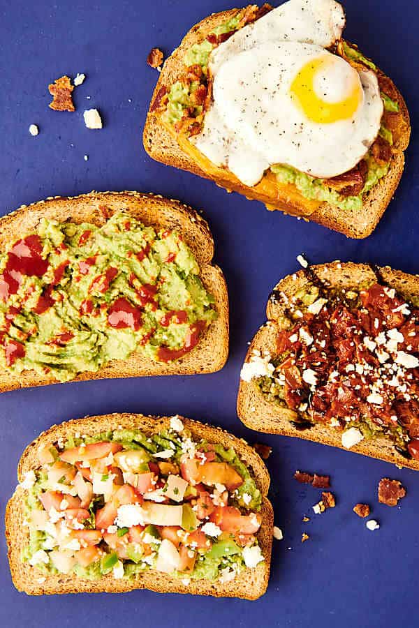 four pieces of avocado toast above