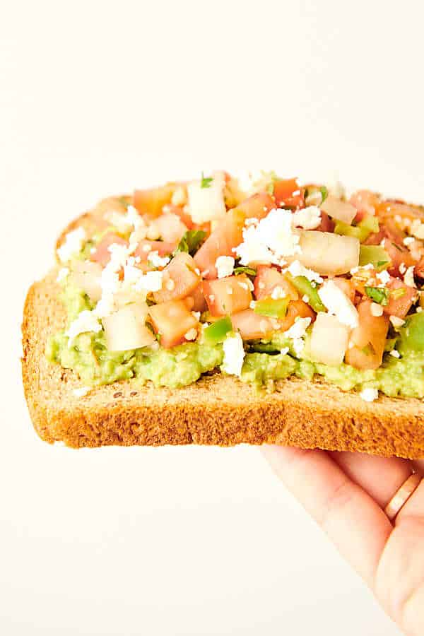 pico de gallo avocado toast held