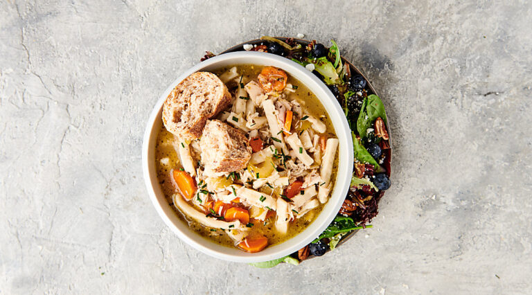 chicken noodle soup in bowl above
