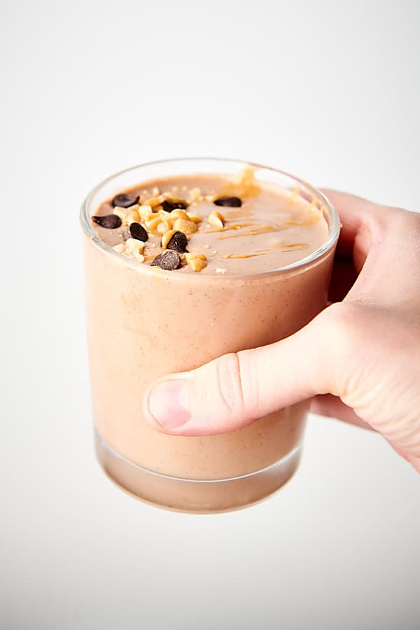 peanut butter banana smoothie held