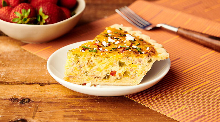 slice of quiche on plate