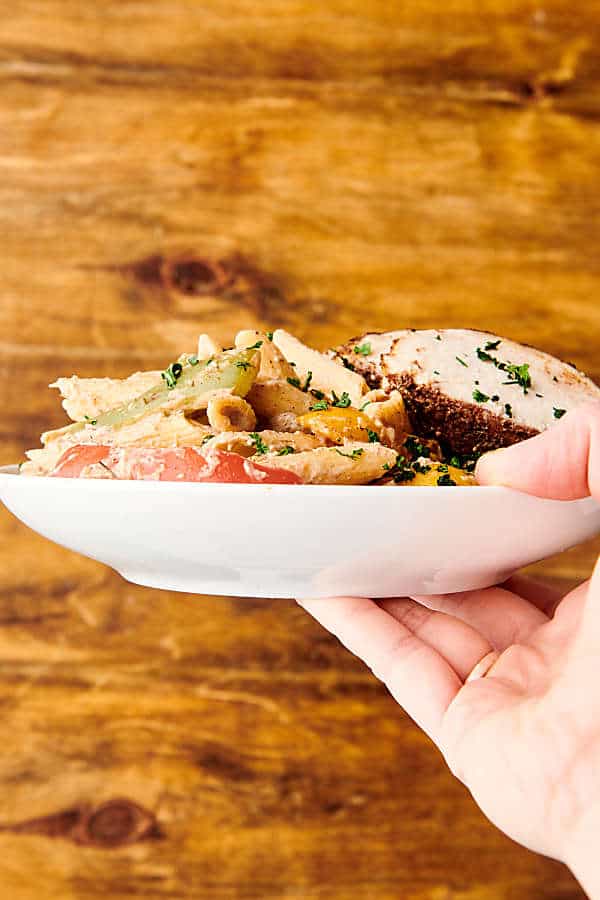 plate with rasta pasta held