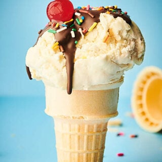 vanilla ice cream cone blue background