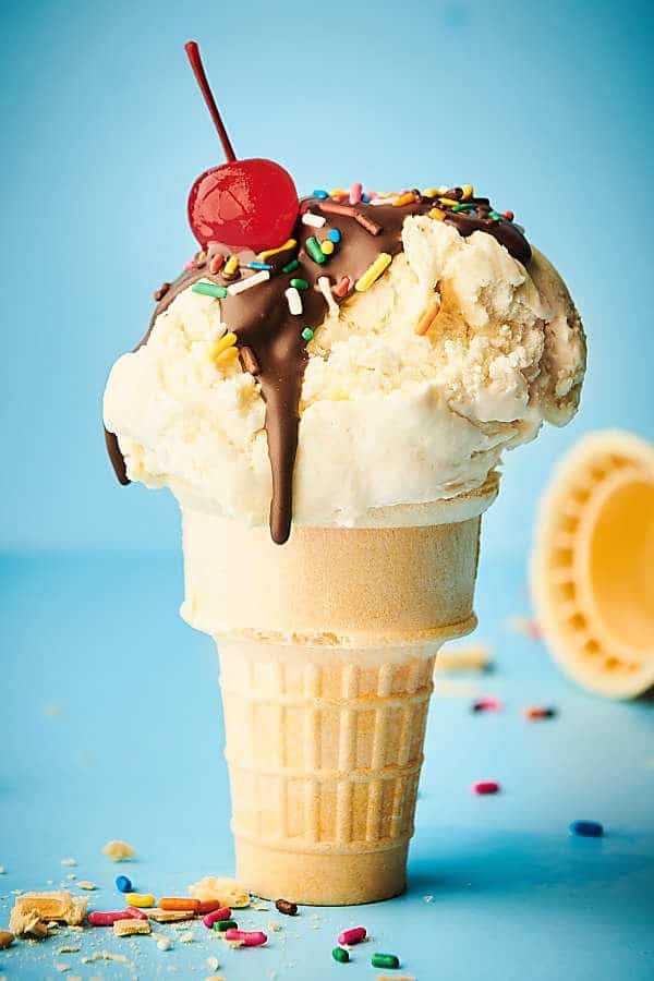 vanilla ice cream cone blue background