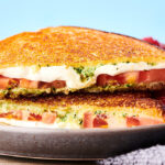 caprese grilled cheese sandwich on plate