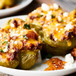 cheesy stuffed peppers on plate