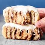two cinnamon rolls stacked