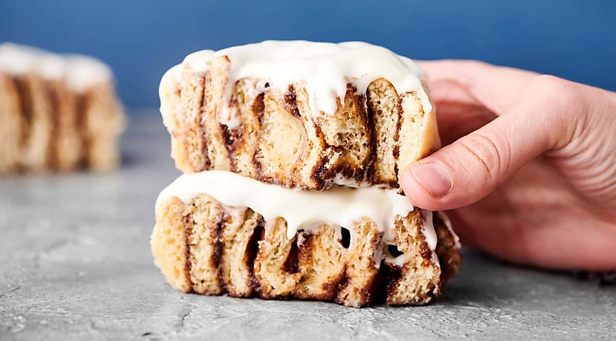 two cinnamon rolls stacked