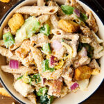 healthy chicken caesar pasta salad bowl above