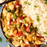 kung pao chicken with rice on plate above