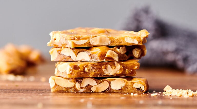 four pieces of peanut brittle stacked