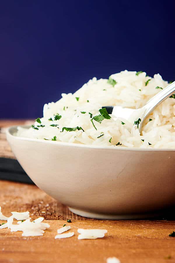 bowl of instant pot basmati rice side view with spoon