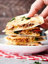 three slices of pizza quesadilla stacked