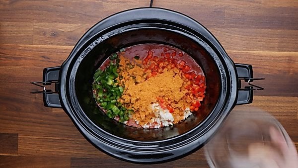 veggies and taco sauce in crockpot