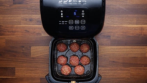 uncooked meatballs in air fryer