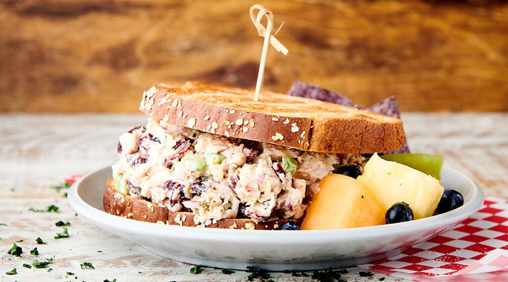 cranberry chicken salad sandwich on plate