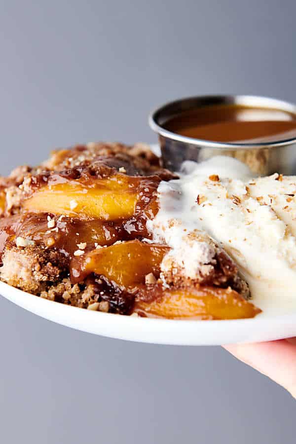 Crockpot Peach Cobbler - with Frozen Peaches and Spice Cake Mix!