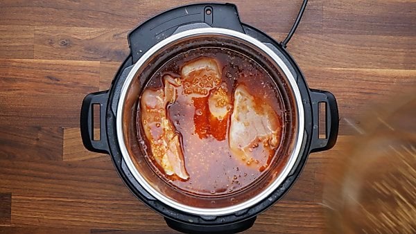 sauce and chicken added to instant pot