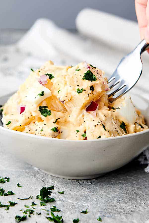 fork in bowl of instant pot potato salad