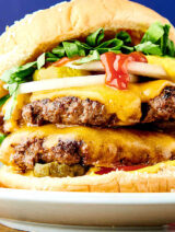 closeup of smash burger on plate