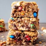 three monster cookie bars stacked