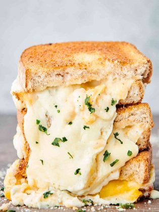 three halves air fryer grilled cheese sandwich stacked