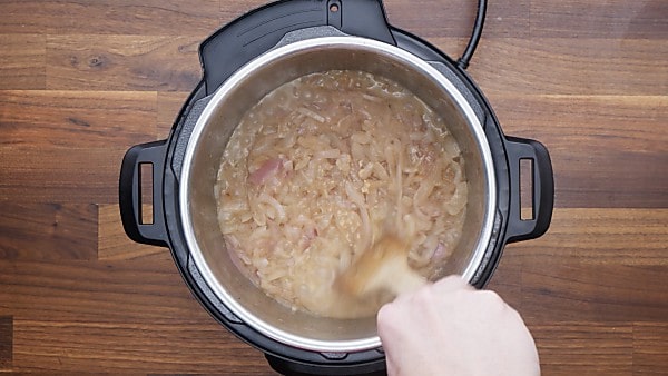 onions being caramelized in instant pot