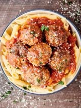 bowl of spaghetti with instant pot meatballs above
