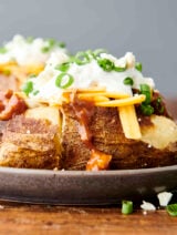 loaded air fryer baked potato on a plate