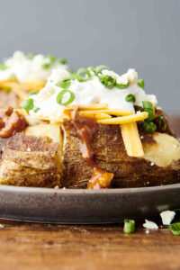 loaded air fryer baked potato on a plate