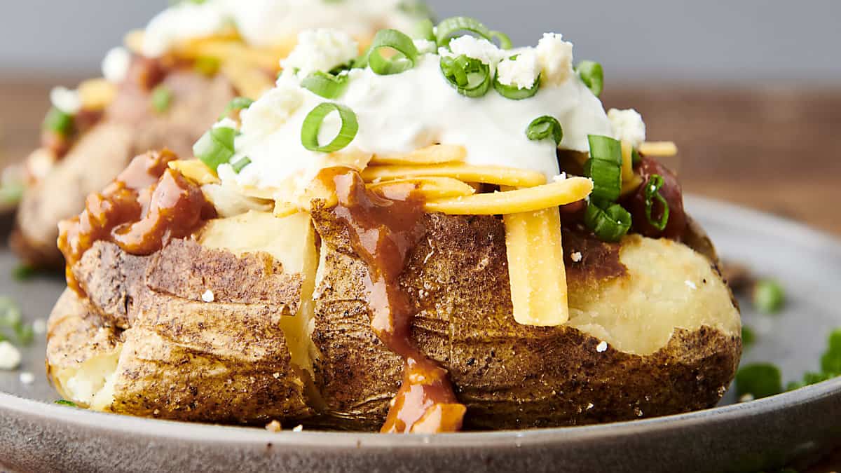 horizontal air fryer baked potato on a plate