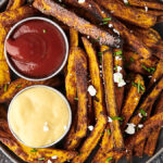 horizontal air fryer sweet potato fries with dipping sauces