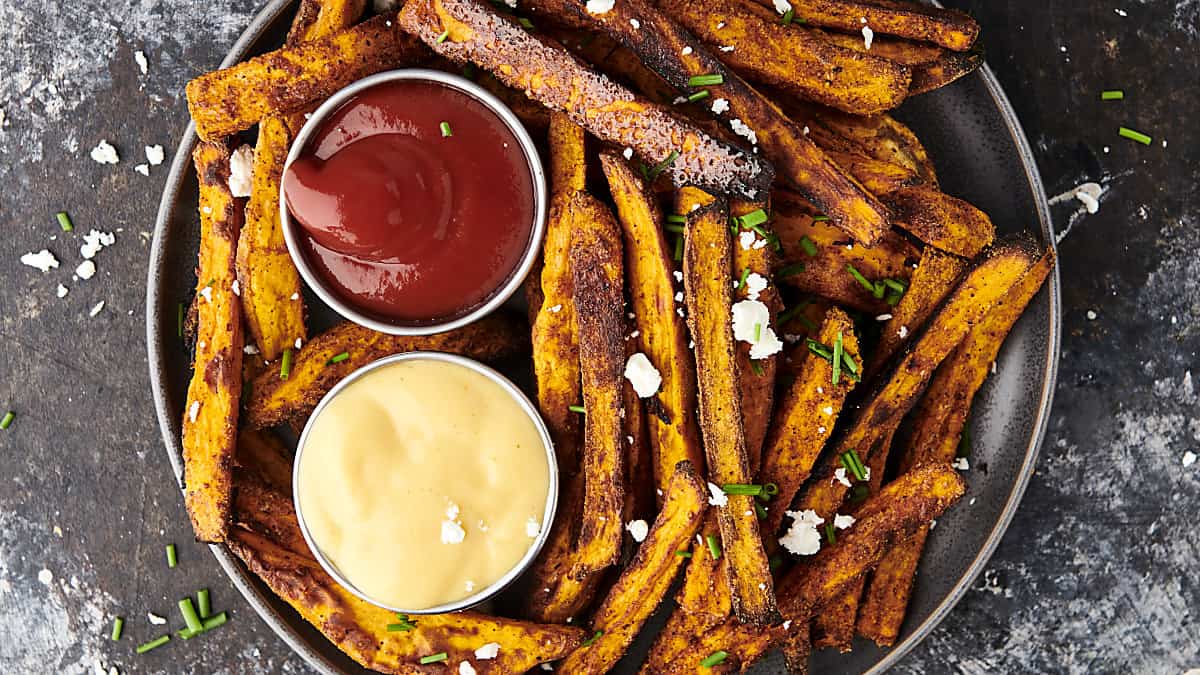 horizontal air fryer sweet potato fries with dipping sauces