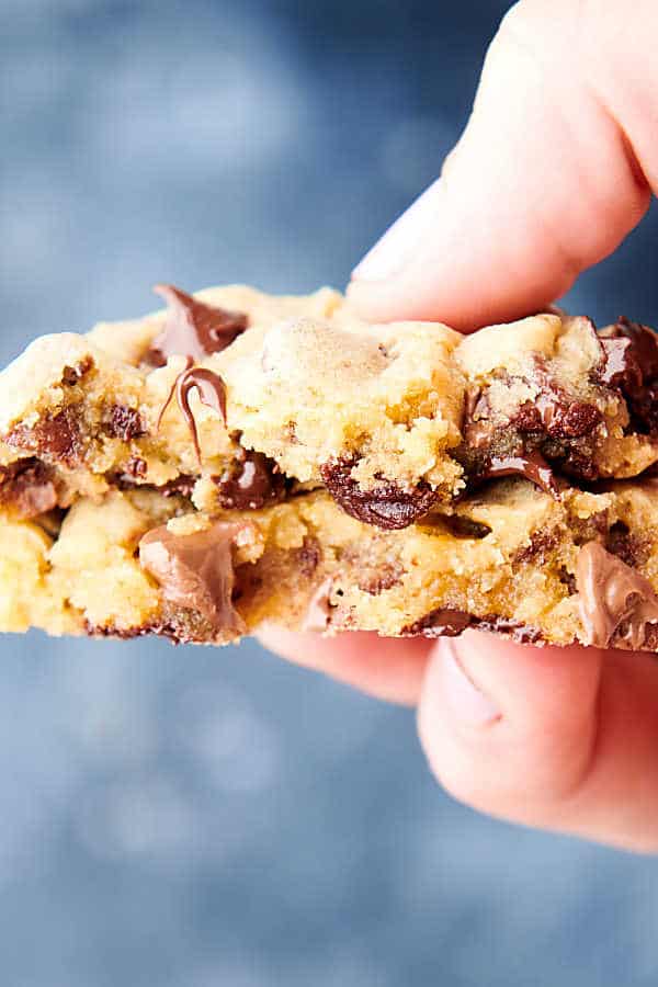 two halves chocolate chip pudding cookies held