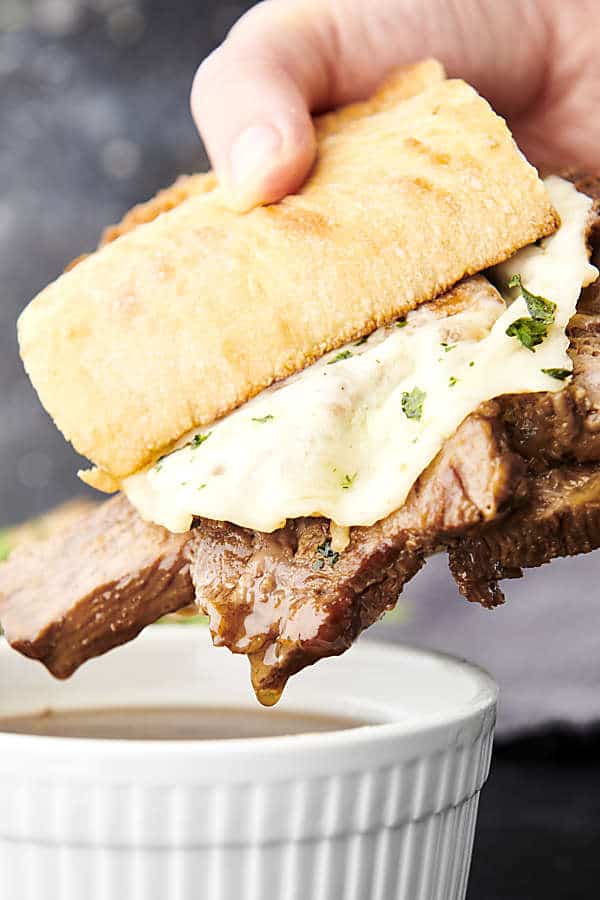 instant pot french dip dunking into au jus