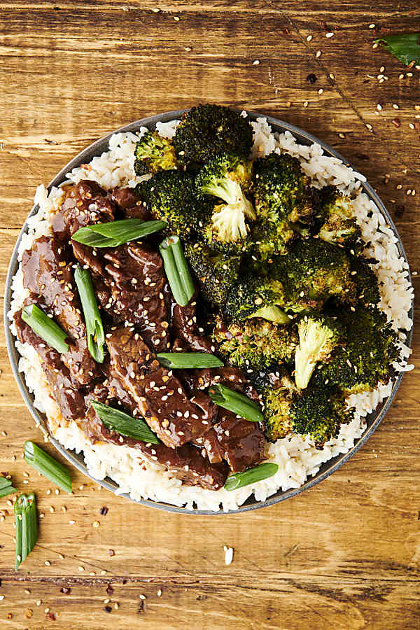 instant pot mongolian beef on a plate with broccoli and rice