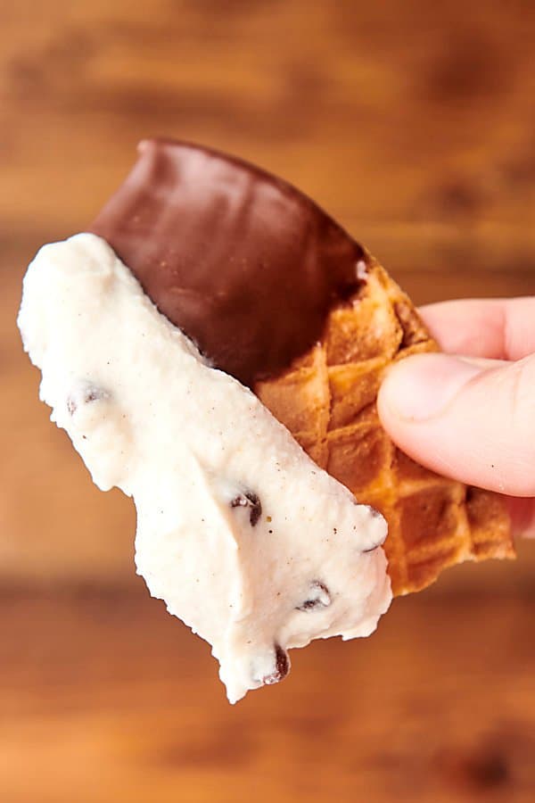 chocolate covered waffle cone chip dipped in cannoli dip