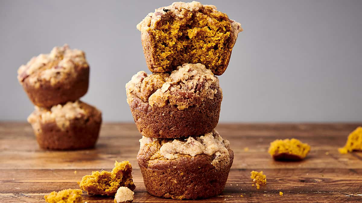 pumpkin muffins with pecan streusel stacked