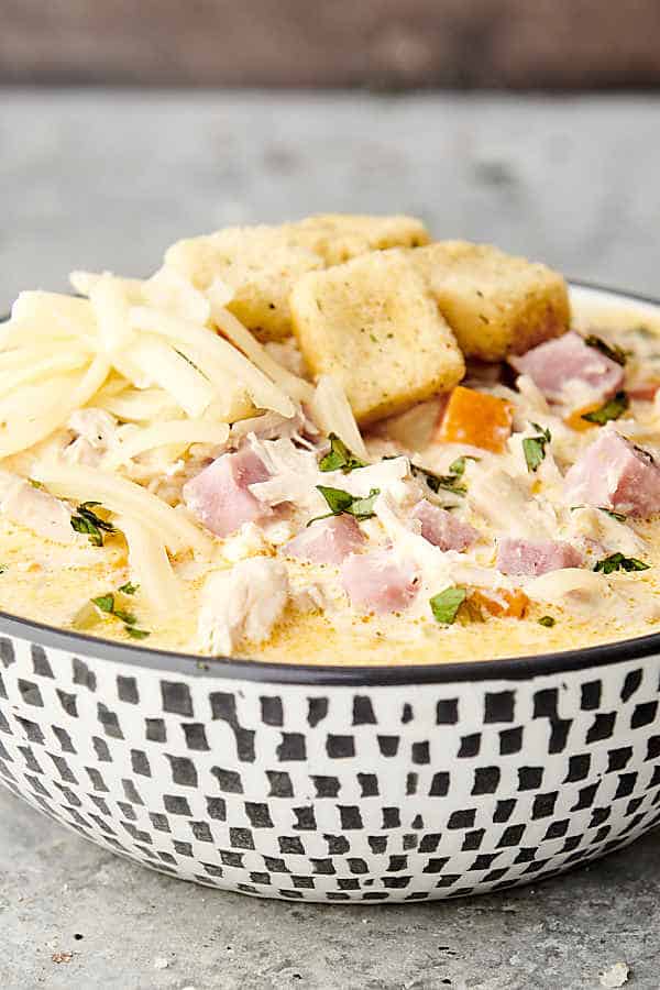 creamy soup with chicken, ham, dijon, and croutons