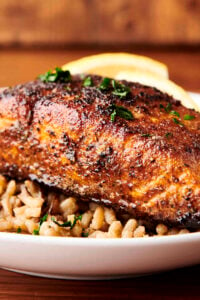 blackened salmon on a bed of rice
